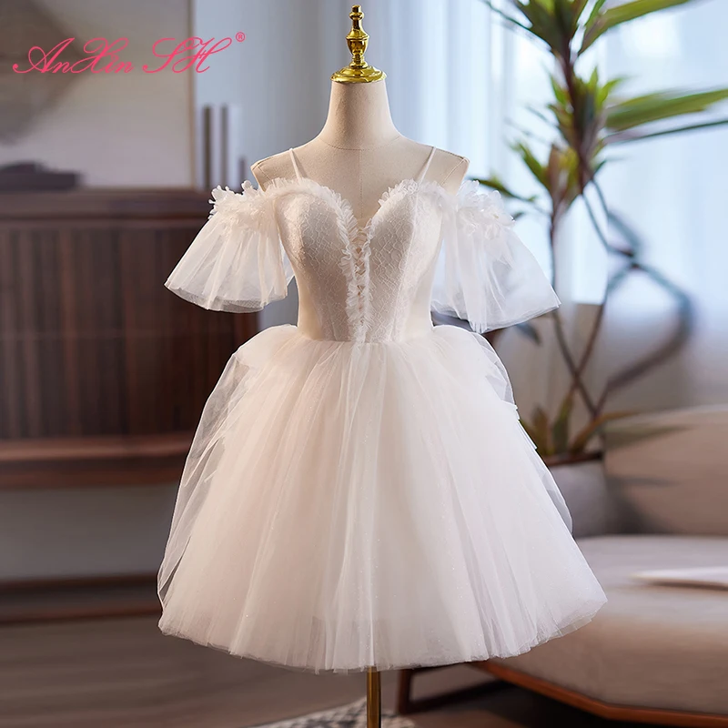 

AnXin SH princess white flower lace spaghetti strap ruffles sleeve short lace up customized evening dress little white dress