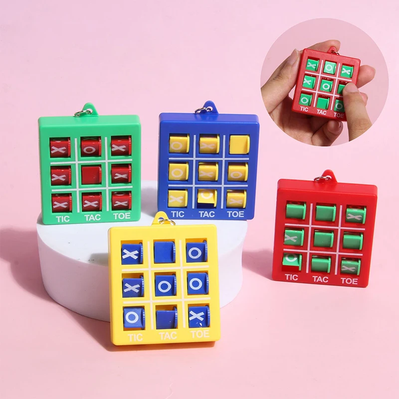 Mini llavero de juego de Tic-tac-toe de interés, rompecabezas colgante, descomprimir XO Spin, juego de ajedrez, juguetes para niños, 1 pieza