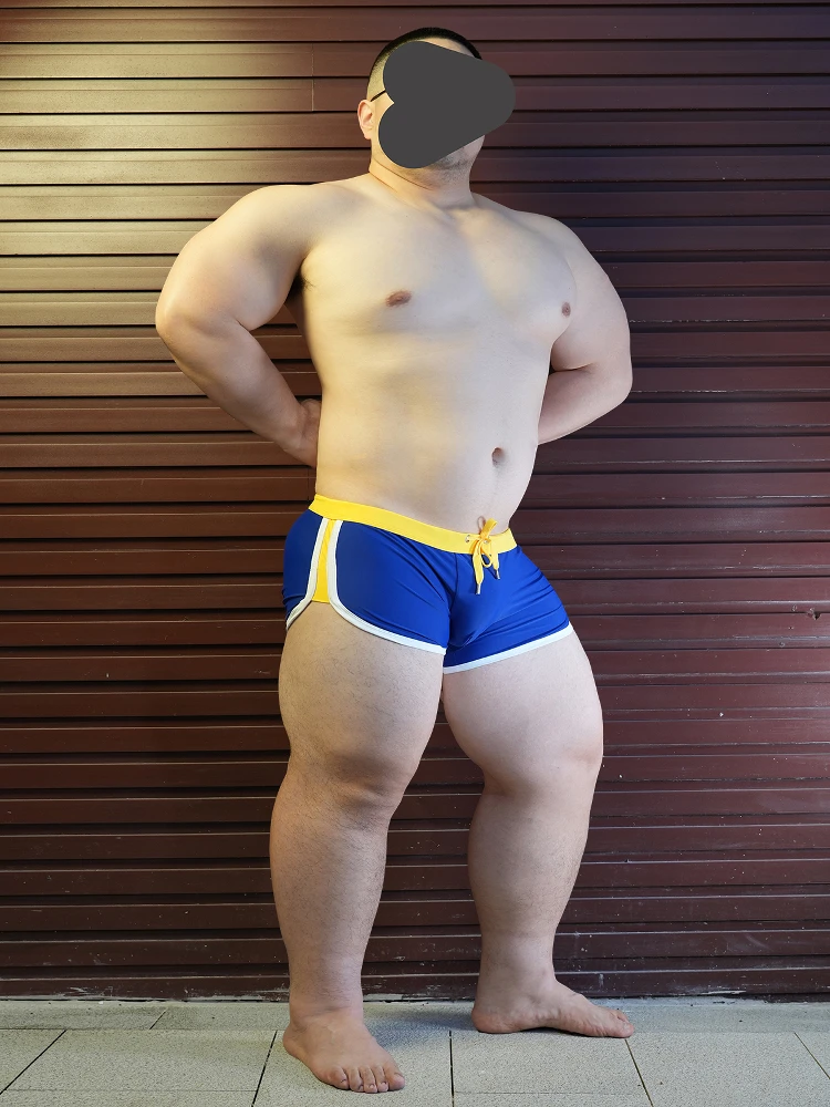 Jugo inicial Serie de doble seguro Bañadores de ángulo plano Traje de baño para hombres Festival de domingos de agua Desfile sexy Qui Dr...