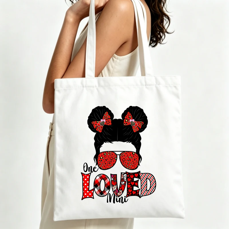 heart and polka dot graphic canvas tote bag with typography print, ideal for casual daily use and shopping outings