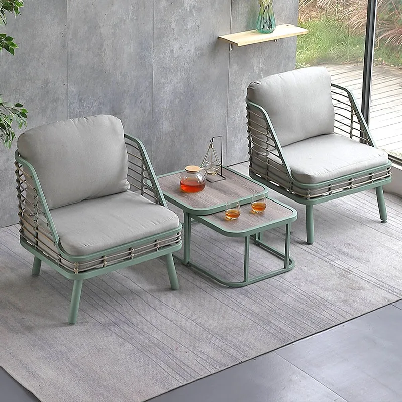 

Nordic outdoor rattan small tables and chairs balcony courtyard garden leisure villa creative three-piece combination furniture