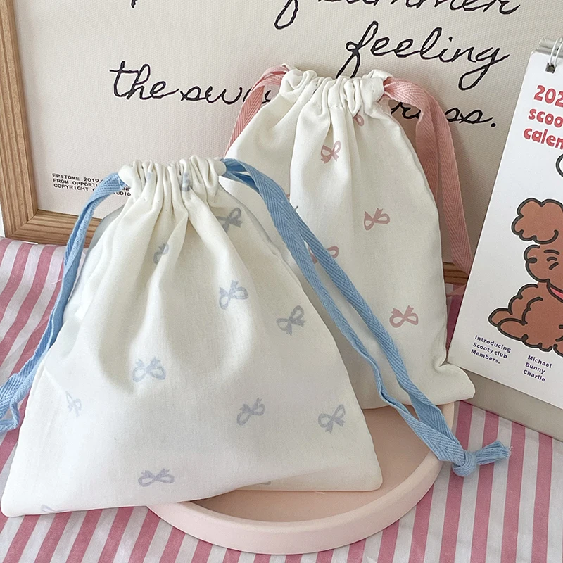 Bolsa de almacenamiento con cordón para el cuidado de la piel, organizador portátil con estampado de lazo rosa, bolsa de maquillaje, ropa interior