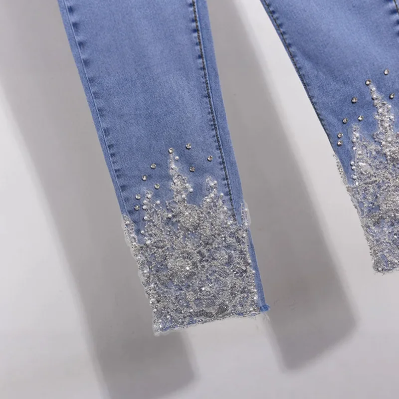 กางเกงยีนส์ ANJY รุ่นใหม่ประจำฤดูใบไม้ผลิ/ฤดูใบไม้ร่วง ปี 2025 สำหรับผู้หญิง ปักลาย แต่งผ้าต่อกัน ทรงสลิมฟิต สวยสง่า สไตล์ลำลอง ความยาวระดับข้อเท้า รุ่น A15601