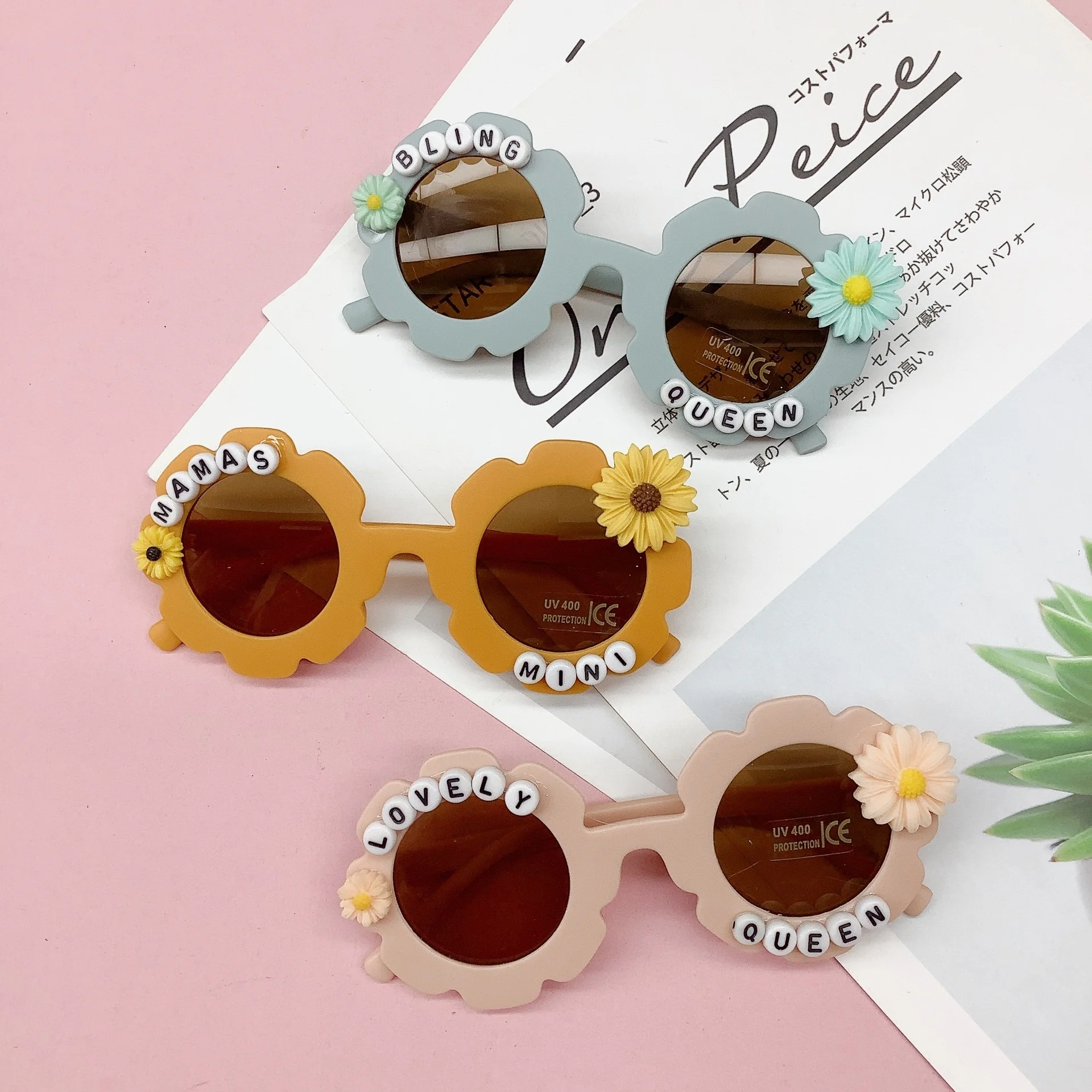 Fashion travel baby sunglasses Korean version sunflower letter flower lovely shape baby sunglasses tide sun visor