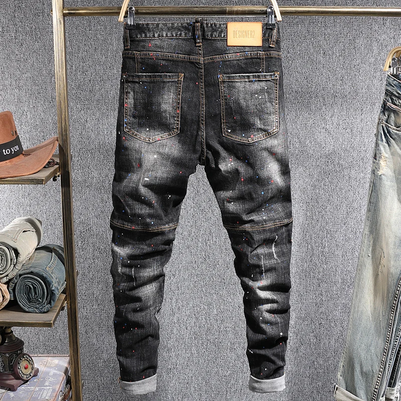 Fashionable new black men's jeans, leather tag, scratch, painted, washed, nostalgic, elastic, slim fit jeans, Israeli designer s