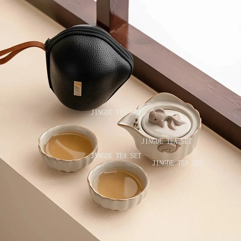 One pot and two cups of beige ceramic Ru kiln travel tea set portable outdoor brewing equipment set