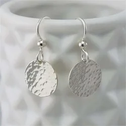 Minimalist metal concave convex small round earrings with feminine temperament, geometric striking circular accessories