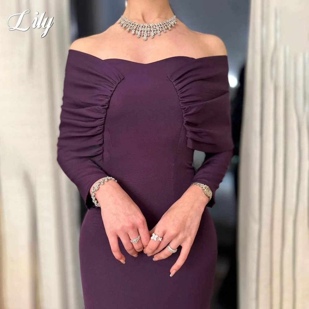 ชุดเดรสปาร์ตี้ลูกไม้สีม่วงมรกตแบบจีบระบาย แขนยาว ทรงเอไลน์ ชายกระโปรงแบบไม่สมมาตร  ชุดราตรีงานกาล่า  สามารถสั่งตัดได้