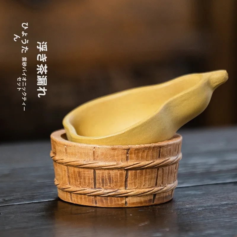 

he Purple Clay Tea Strainer One-Piece Tea Brewing Ornament Imitation Biodiversi Fortune Lantern Gourd Tea Pet Bath Tub