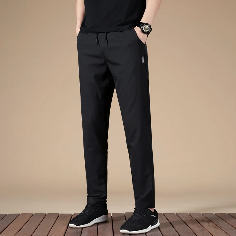 Men's Spring Autumn Solid Bandage Drawstring Elastic Pocket High Waist Casual Loose Sports Trousers Fashion Office Lady Pants