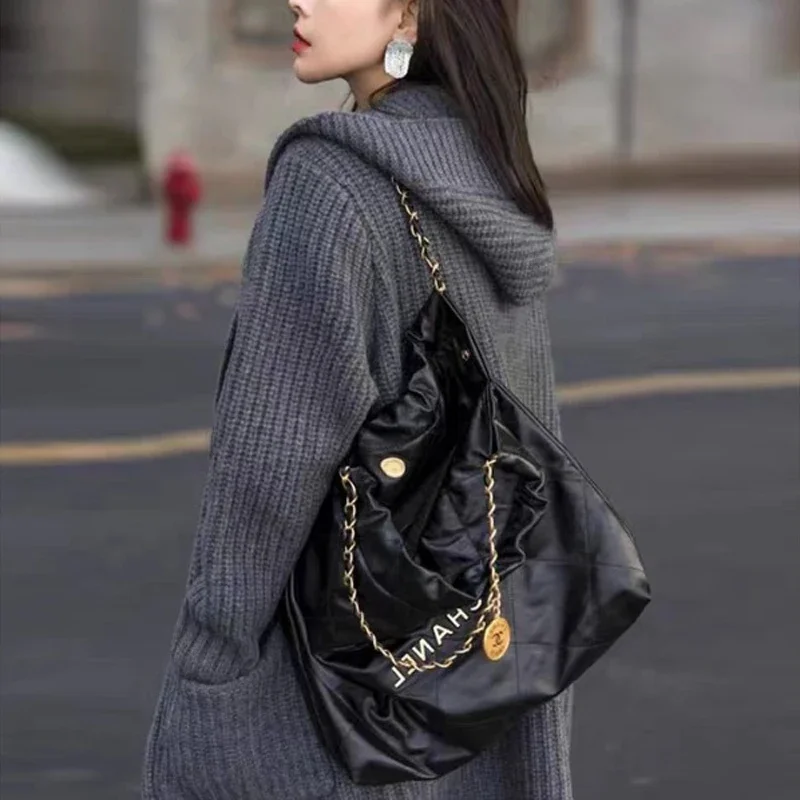 الخريف والشتاء المرأة الجديدة مقنعين سترة طويلة الأكمام سترة عادية فضفاضة متوسطة وطويلة بلون تريكو سترة