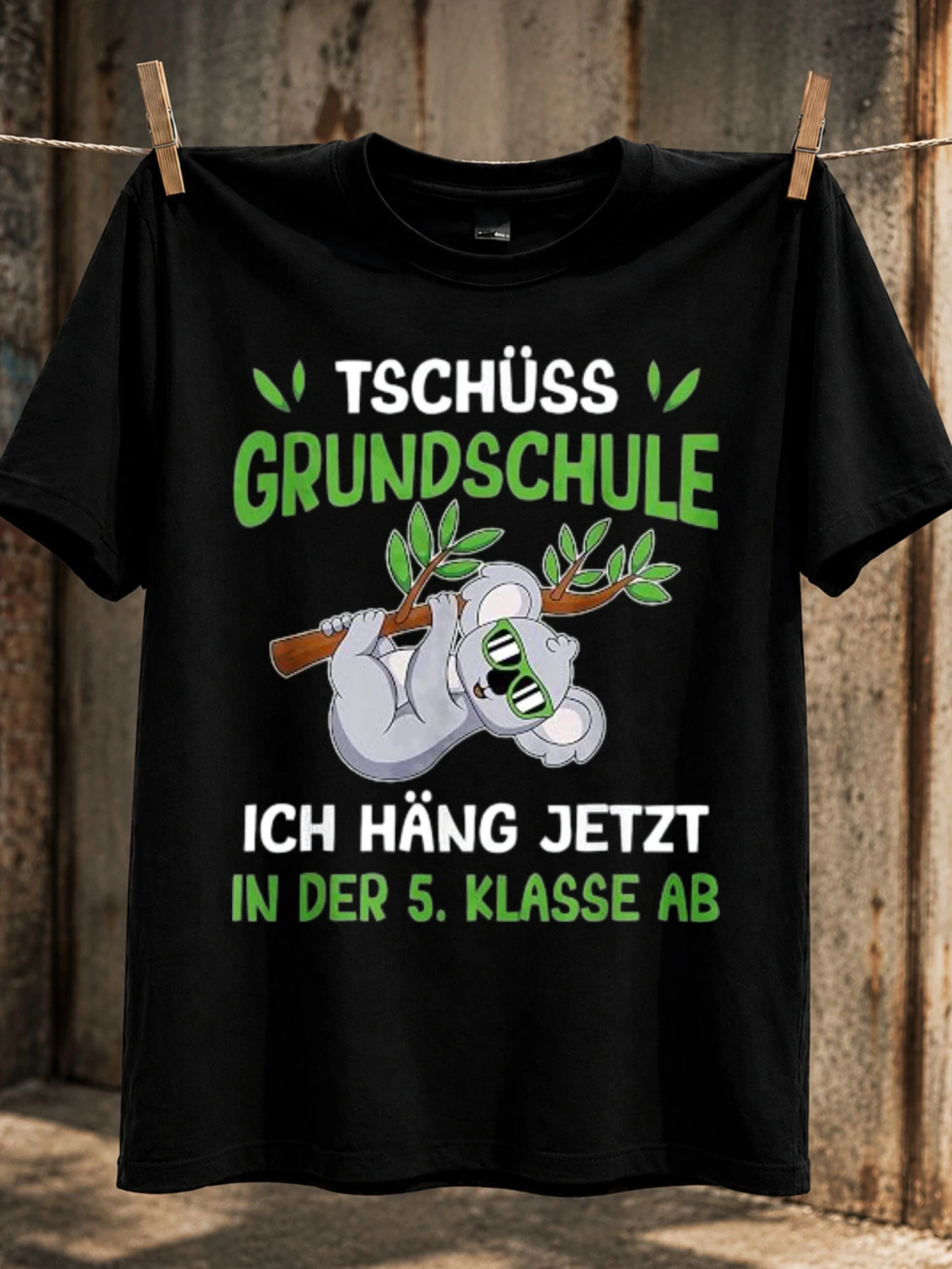 Tschuss Grundschule koala hanging on branch with green lettering fifth grade school transition  Unisex All T-Shirt