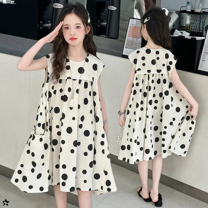 

Черно-белое летнее платье без рукавов в горошек для девочек. Летнее платье для детей. Платье подходит для детей от 7 до 14 лет.