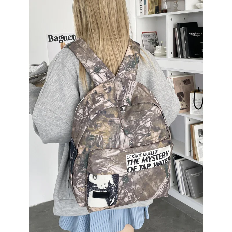 

Men's backpack2025New large-capacity travel bag for girls, middle school students, high school students, and college students, t