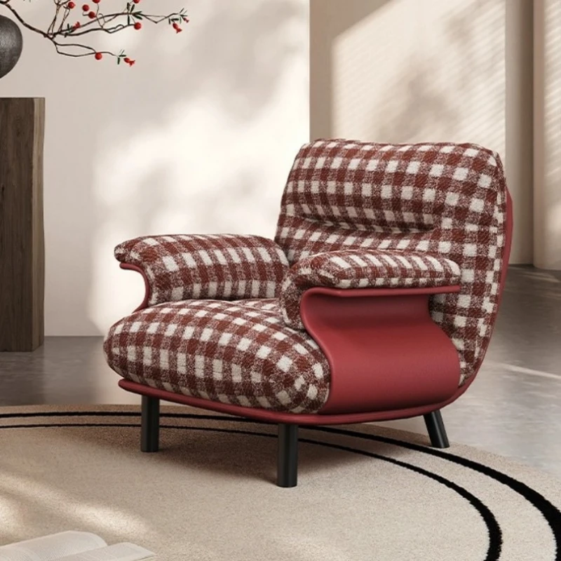 

Nordic small apartment designer armrest recliner, down-wrapped living room single sofa