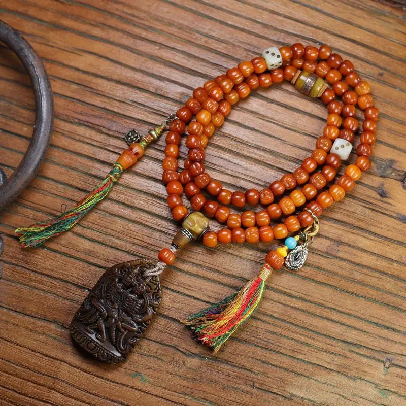 Tibetan Yak Carving, Peach-Shaped Pendant Necklace, Featuring 108 Old Bone Beads