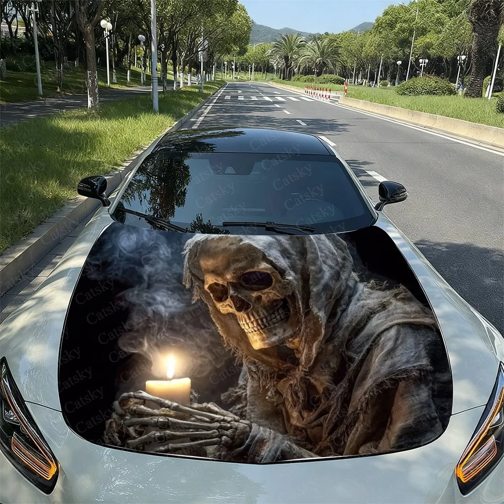 

Gothic skull with a candle, draped in tattered cloth. Perfect for spooky car decor. Fits most vehicle hoods. Adds eerie charm to