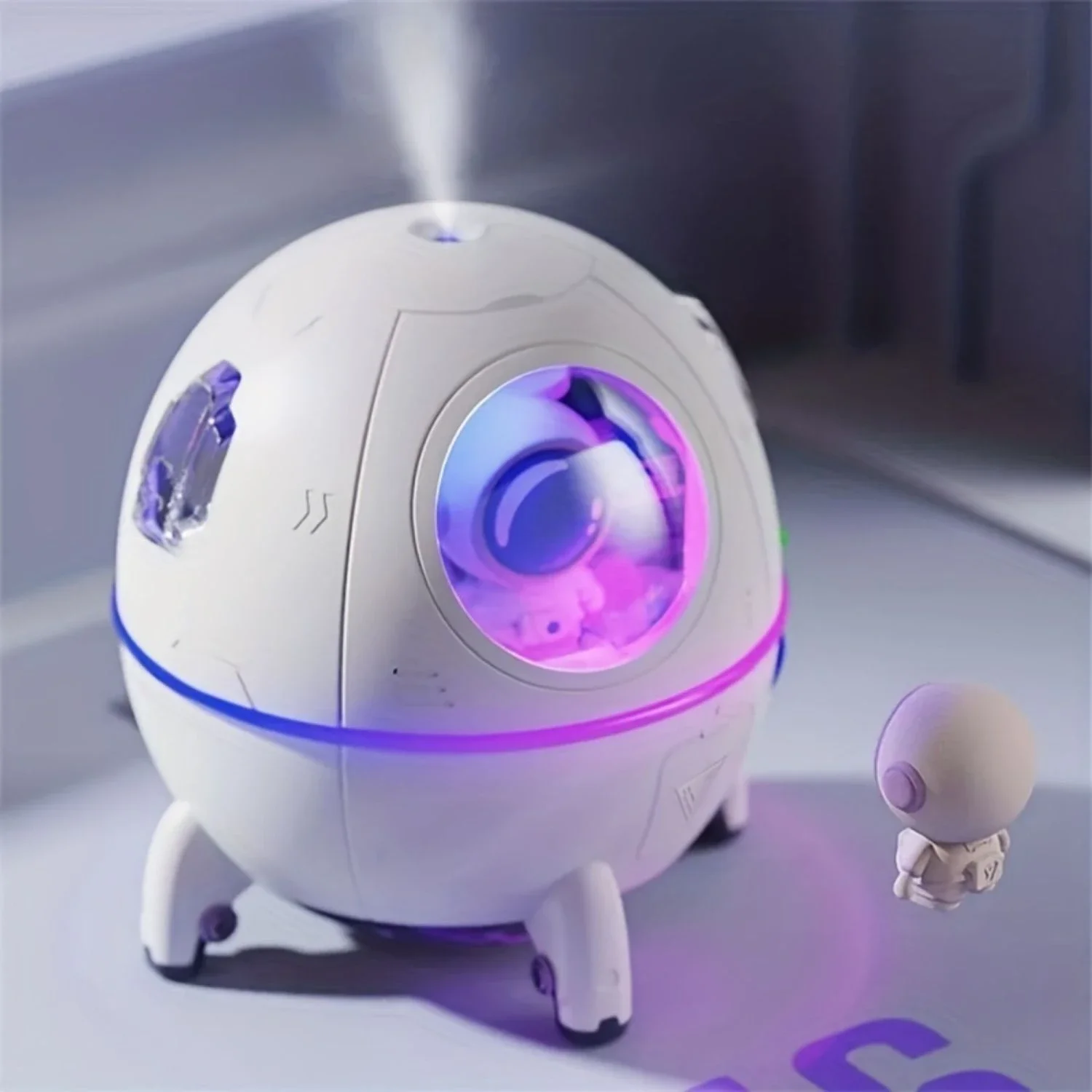 High-value one-piece design small and convenient space capsule USB plug-in air humidifier for household use with stylish appeara