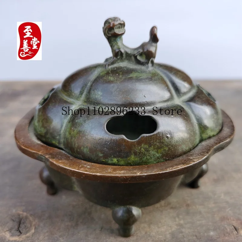 Antique-style alloy copper incense burner with a patina effect, designed for living room decoration, featuring a lion-shaped lid