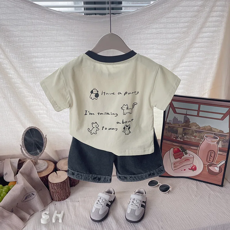 بدلة أطفال 2026 ملابس صيفية للأطفال الأولاد ملابس أطفال لطيفة مطبوعة على شكل كلب بأكمام قصيرة تي شيرت علوي وسراويل قصيرة طقم مكون من قطعتين ملابس للأولاد #3