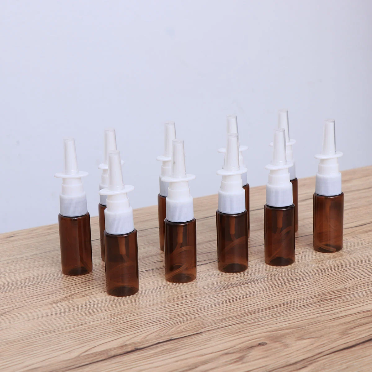 

15pcs 15ml Portable Nasal Sprayer Bottle Refillable Fine Mist Empty Spray Bottles (Brown Pet + 18R Direct Injection)