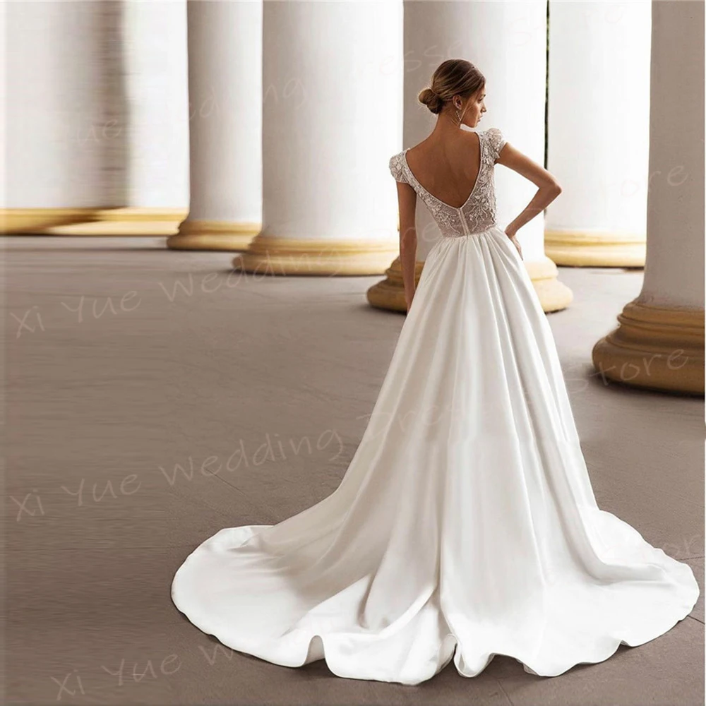 Gaun pernikahan wanita Modern elegan gaun pengantin lengan topi renda applique A-Line indah gaun pengantin Backless Vestidos De Novia Lujo