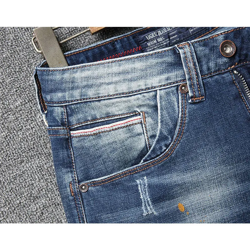 Jeans da uomo streetwear alla moda, jeans patchwork di mucca spaccati elasticizzati blu lavati retrò di alta qualità, re da uomo firmato