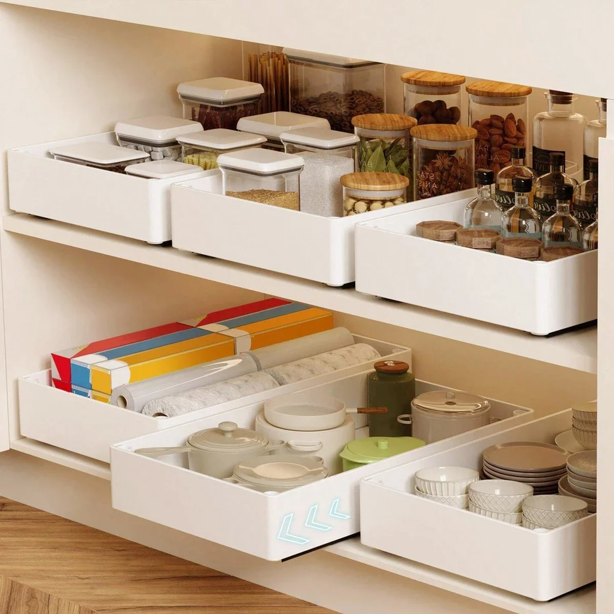 

A white pull-out storage tray - a plastic condiment organizer for kitchen cabinets - an under-cabinet storage organizer