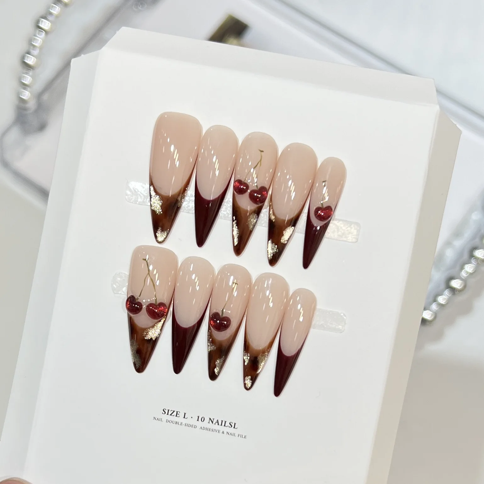 10 szt. Luksusowe, ręcznie robione, długie sztuczne paznokcie typu stiletto, nude z panterką, efekt kociego oka, francuski manicure, dekoracje 3D z czerwonymi wiśniami, paznokcie do noszenia.