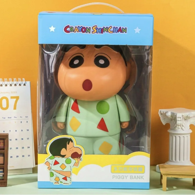 

2024 New Kawaii Crayon Shin Chan Piggy Bank Cute Anime Peripheral Student Shin-chan Pajamas Vinyl Coin Storage Piggy Bank