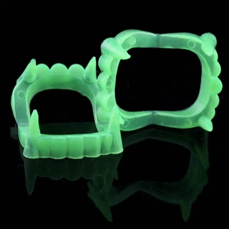 April Fool's Day tricky toys glow-in-the-dark dentures, glow-in-the-dark zombie teeth, little tiger teeth