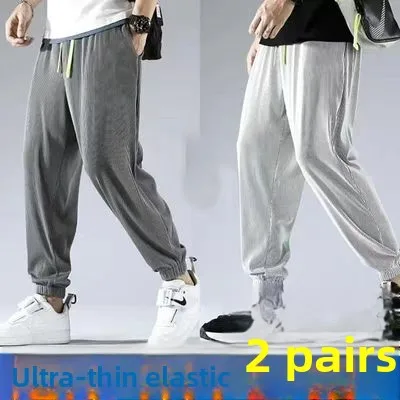 Pantaloni casual di marca alla moda sottili estivi da uomo in seta di ghiaccio Pantaloni per il tempo libero con risvolto ampio a nove punti Gamba dritta Sensazione di freschezza