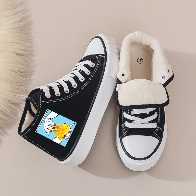 

Women's Black Fleece-Lined Canvas Shoes: Cartoon Flame Print & Velcro. Warm for Autumn/Winter. Pair with Jeans, Sweaters.