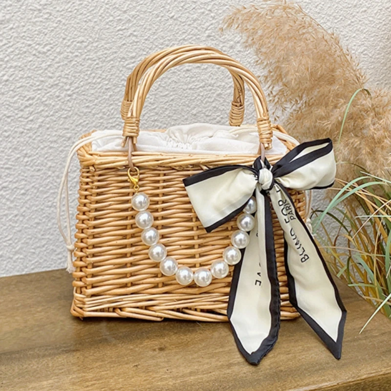 

Summer Bohemian Style Handmade Rattan Woven Handbag Ladies Travel Vacation Beach Bag Drawstring Design Picnic Fabric Rattan