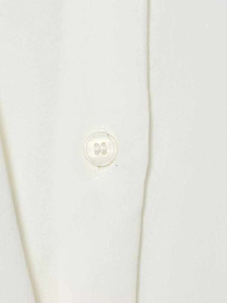 European and American style winter new arrivals, simple and fashionable women's round neck long sleeve asymmetrical shirt