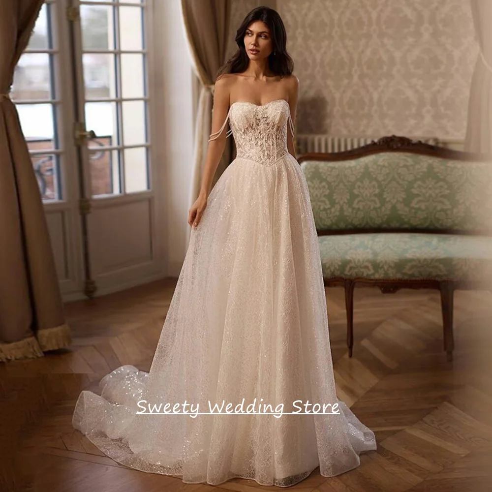 

Sparkling Wedding Dress 2026 Customized Detachable Pearls Off Shoulder Sweetheart See Through Applique Sweep Train Bridal Gown