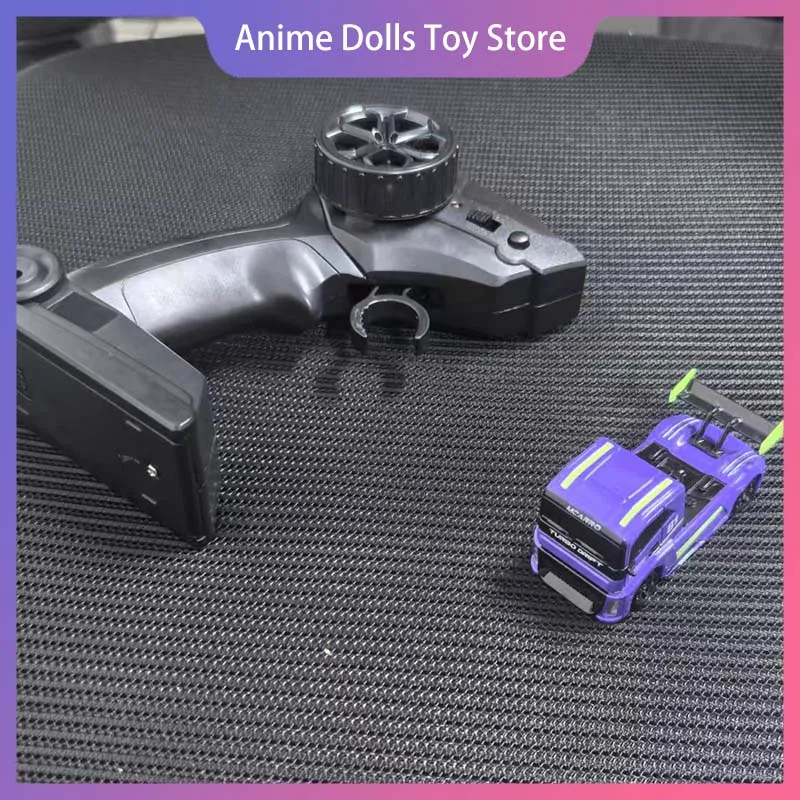 

Мини-радиоуправляемый автомобиль Mc081 1:87 Мини-радиоуправляемый автомобиль 2,4G 4WD Электрический дрифт-грузовик с дистанционным управлением Внедорожная игрушка Настольный дрифт Подарок на день рождения