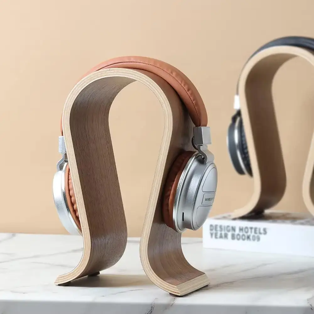 

2025 Новая минималистичная подставка для наушников из цельного дерева, универсальный U-образный дизайн, совместимая с большинством игровых и офисных гарнитур