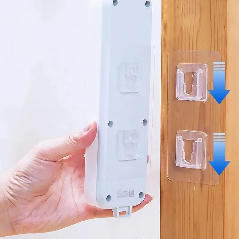 

Double-sided Adhesive wall Mounted Power Socket Bracket Holder Transparent and Traceless Adhesive Storage Buckle