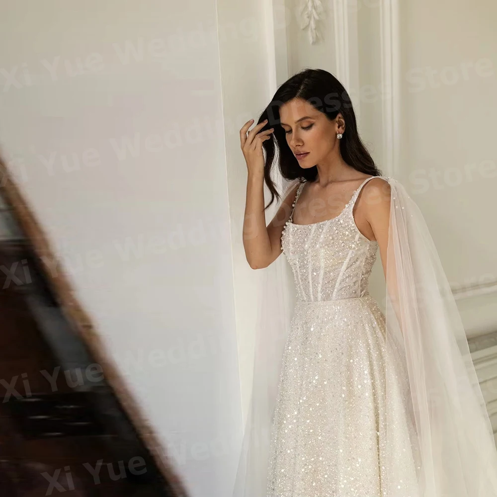 فساتين زفاف نسائية متألقة على شكل حرف A مطرزة فيستدو دي نوفيا أشرطة سباغيتي بدون ظهر فساتين العروس مخصصة رداء دي ماري