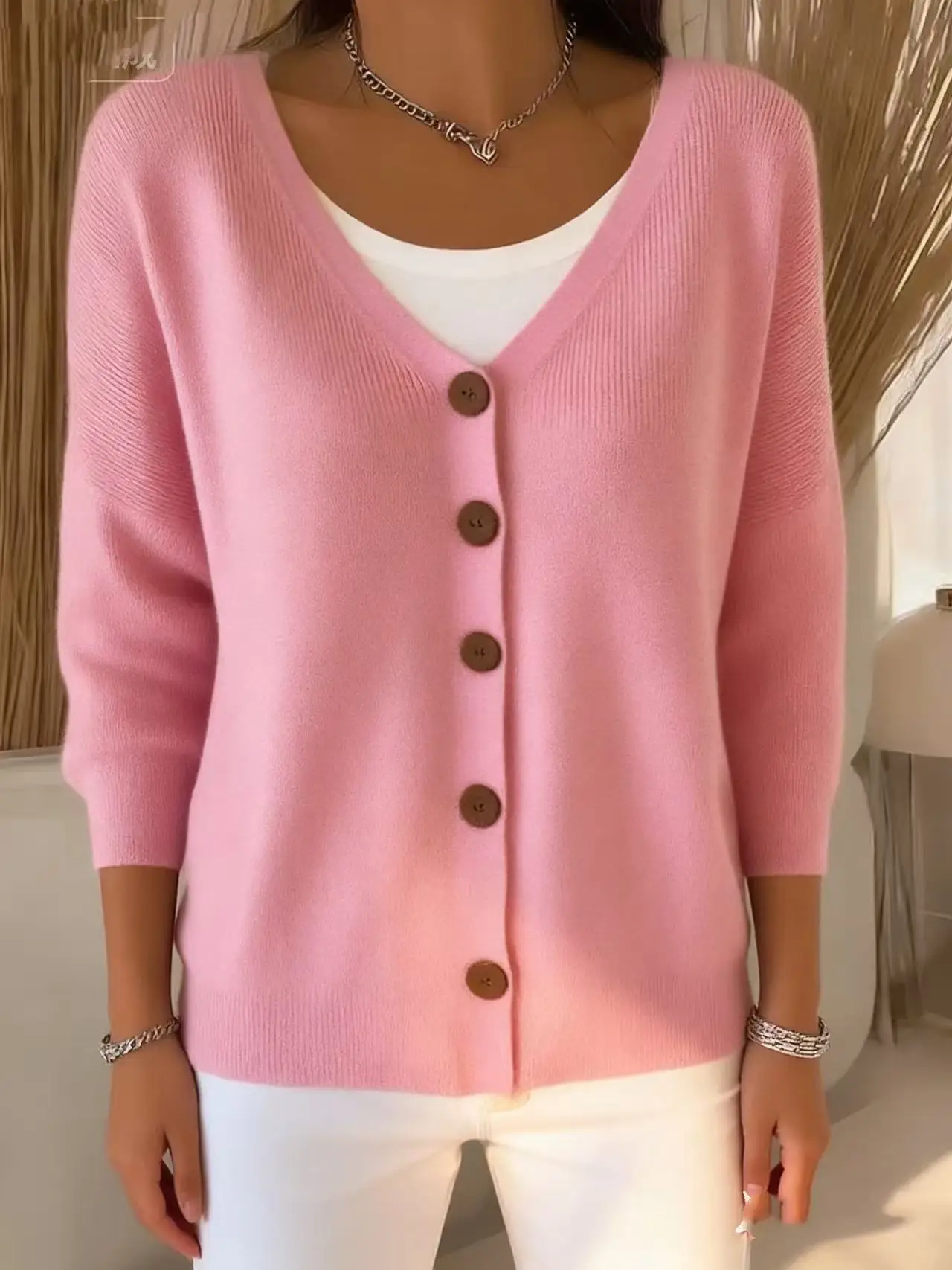 

Women's autumn and winter V-neck button long-sleeve knitted cardigan, featuring a soft button placket design,