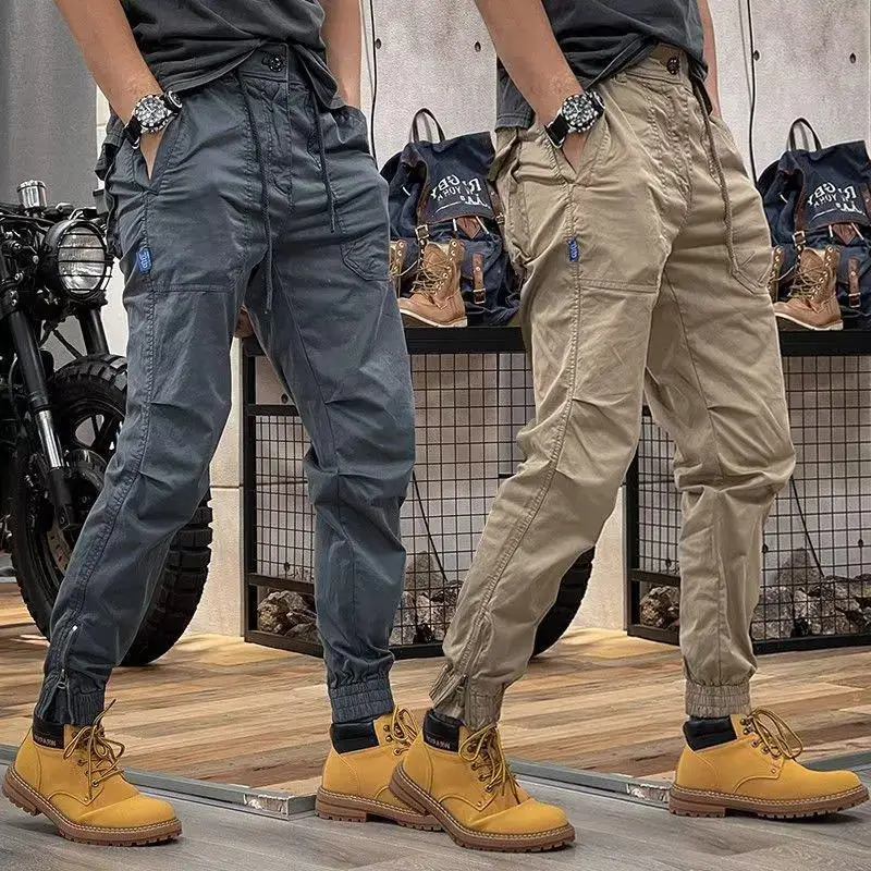 Pantalones de trabajo de Hip-hop Retro para hombre, pantalones de cintura elástica con cremallera, Bolsillo grande Simple, con cordones, estilo