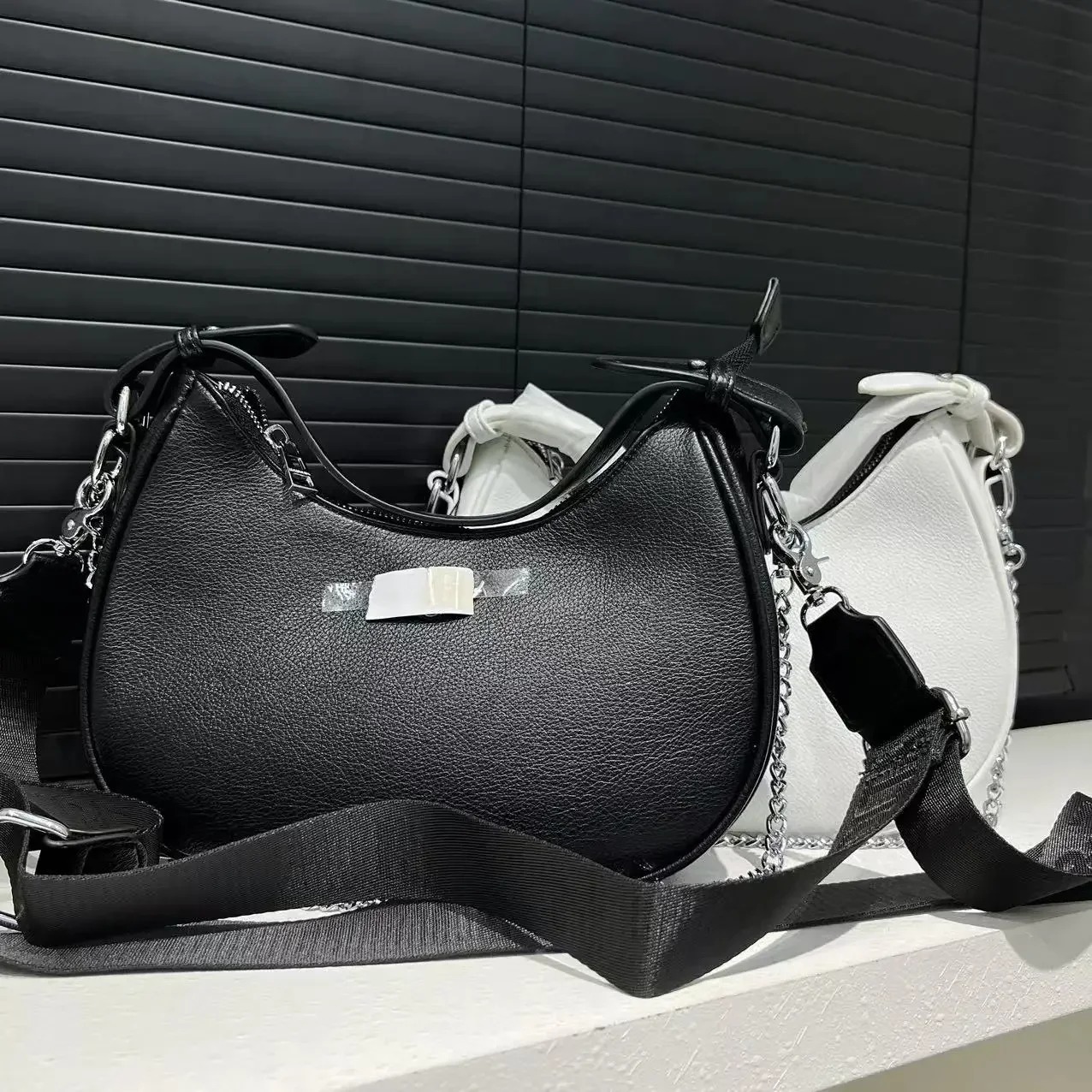 Women's fashion designer light luxury half moon simple shoulder bag