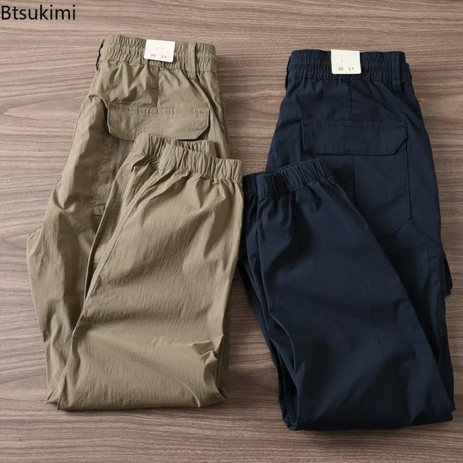 

High Quality Joggers Trousers Men's Loose Leisure Cargo Pants Solid Breathable Drawstring Multi Pocket Sweatpants 2025 Men Pants