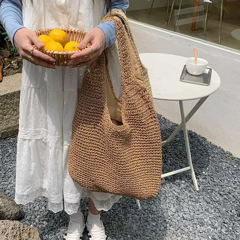 Gewebte Strohtasche im französischen Stil mit großem Fassungsvermögen für Damen, neue Strand- und Urlaubstasche, lässige Pendler-Tragetasche