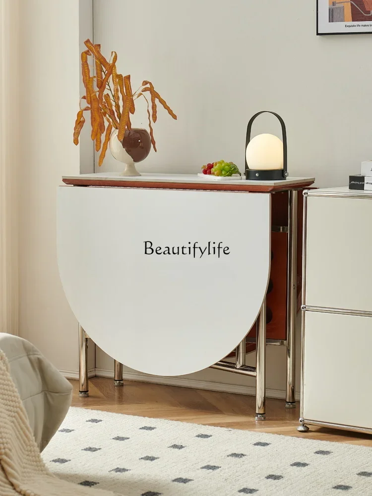

ls 04 Nordic rock slab dining table in the ancient style household small apartment foldable stainless steel oval table
