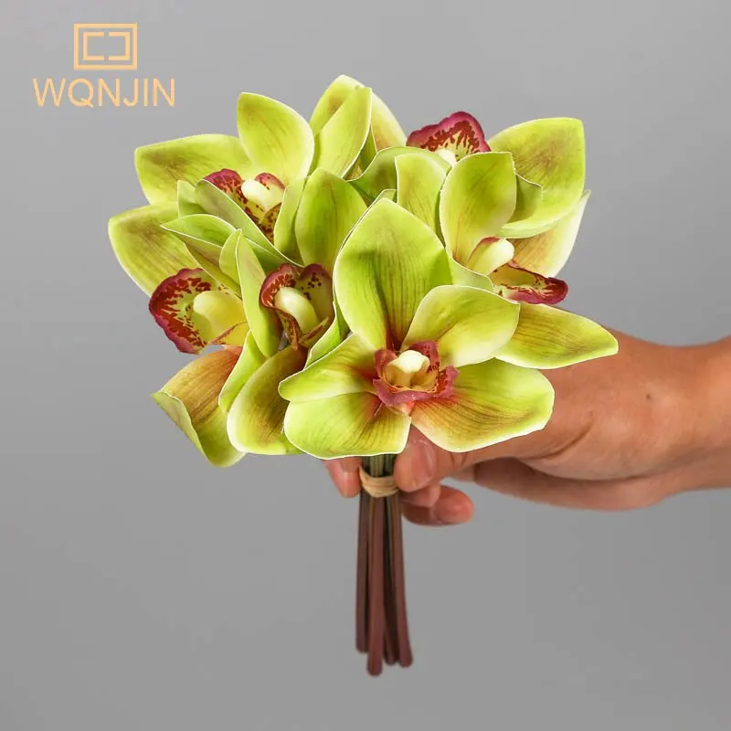 6pcs/lot Simulated Bouquet Cymbidium Magnolia Hand Holding Flower Hand Binding Cymbidium Silk Flower Home Decoration Wedding