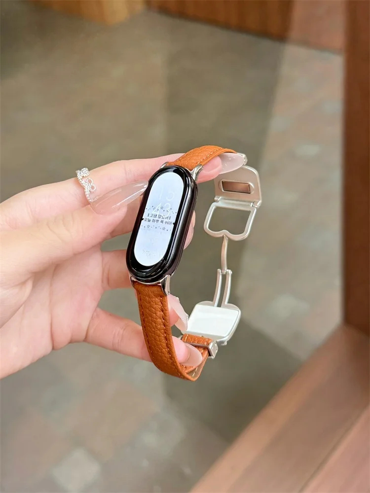 

Suitable for genuine leather lychee patterned watch strap Xiaomi Band 8Pro/9Pro，For Mi band 3/4/5/6/7，8/8NFC/9/9NFC/10/10NFC，For