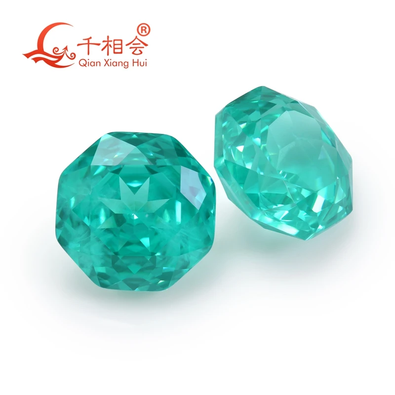 

Octagonal shape rose cut lab grown paraiba color Yttrium Aluminum Garnet Cultivated Tsavorite with inclusions gem stone