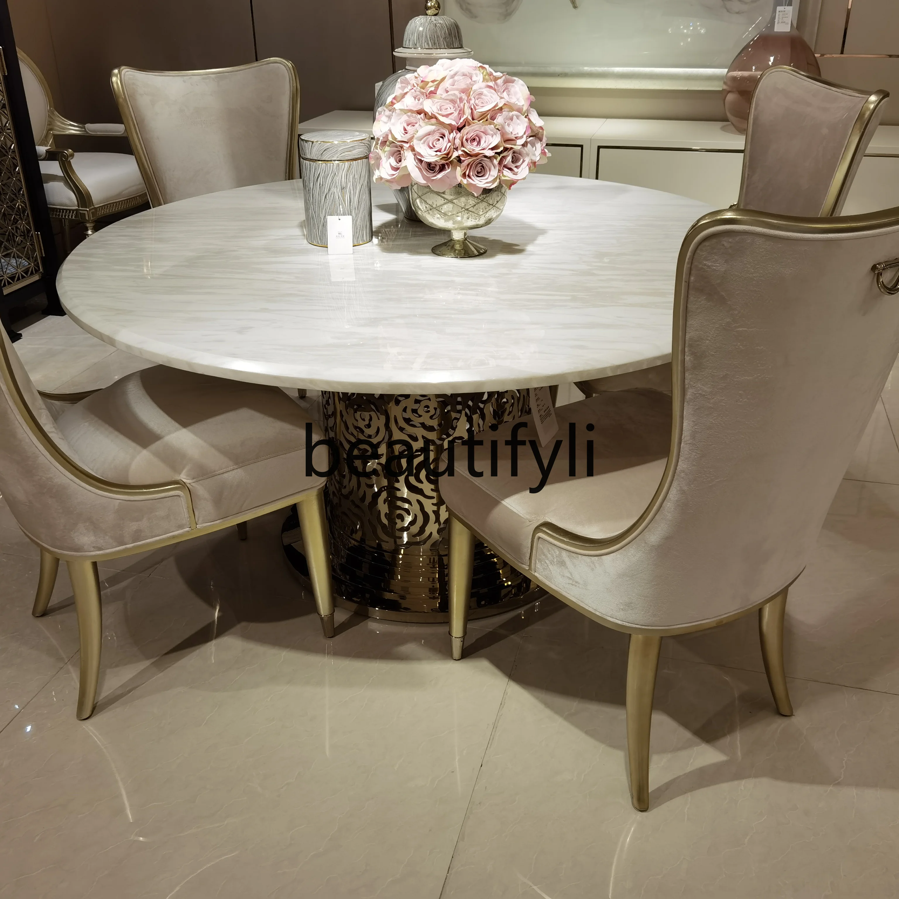 

Light luxury dining table Modern fashion simple dining room furniture Stainless steel bottom frame Round dining table
